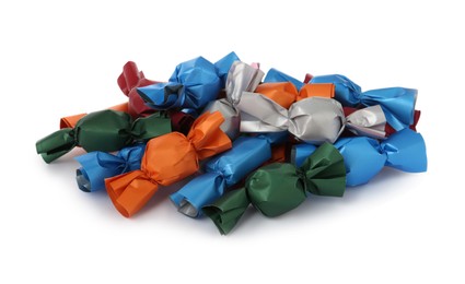 Photo of Many candies in colorful wrappers on white background