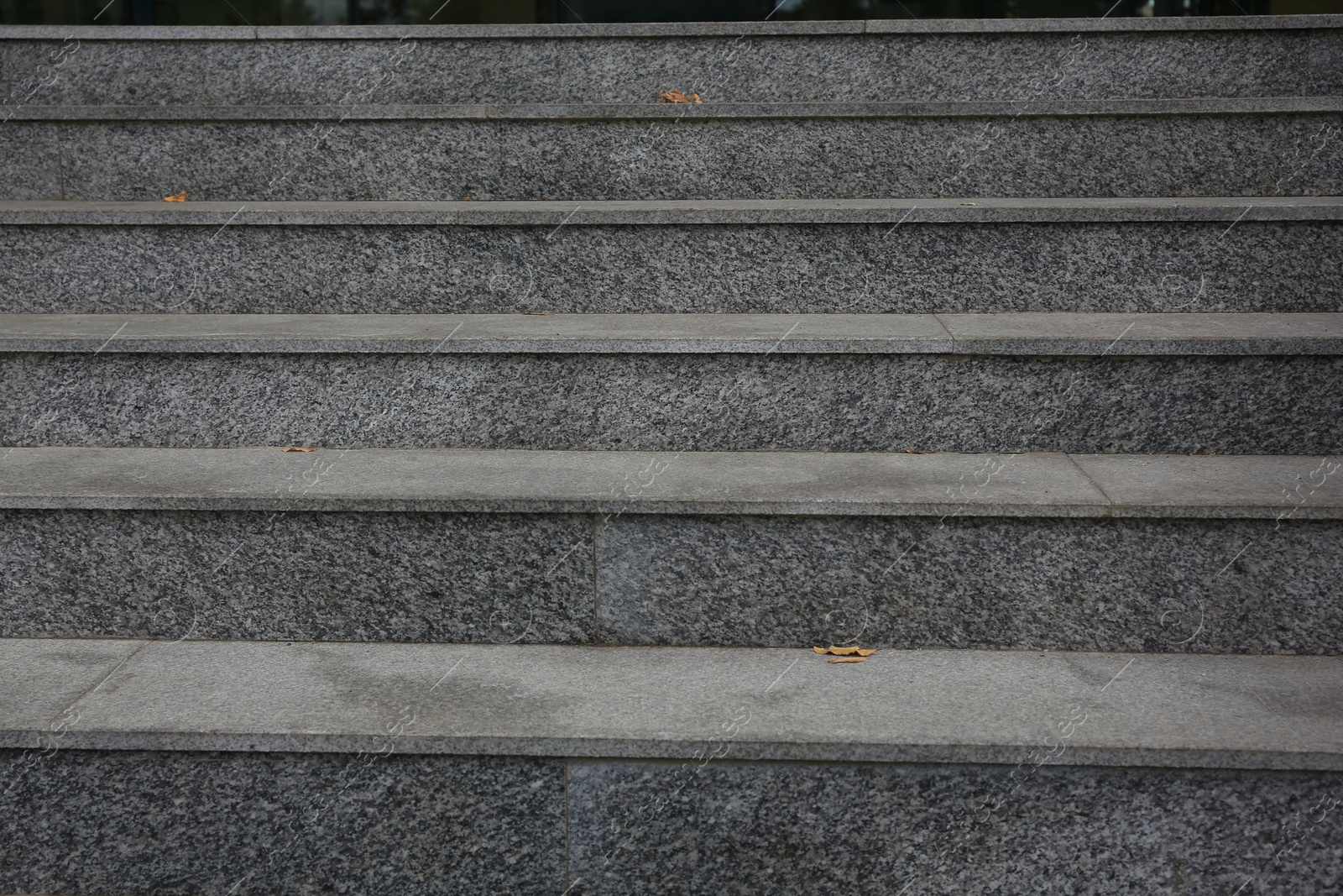 Photo of View of empty grey tile staircase outdoors, closeup