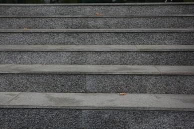 Photo of View of empty grey tile staircase outdoors, closeup