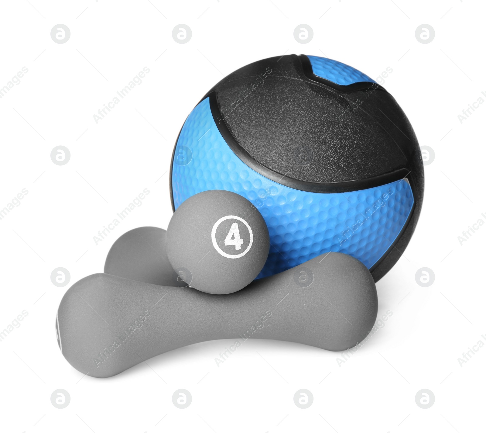 Photo of Medicine ball and dumbbells on white background