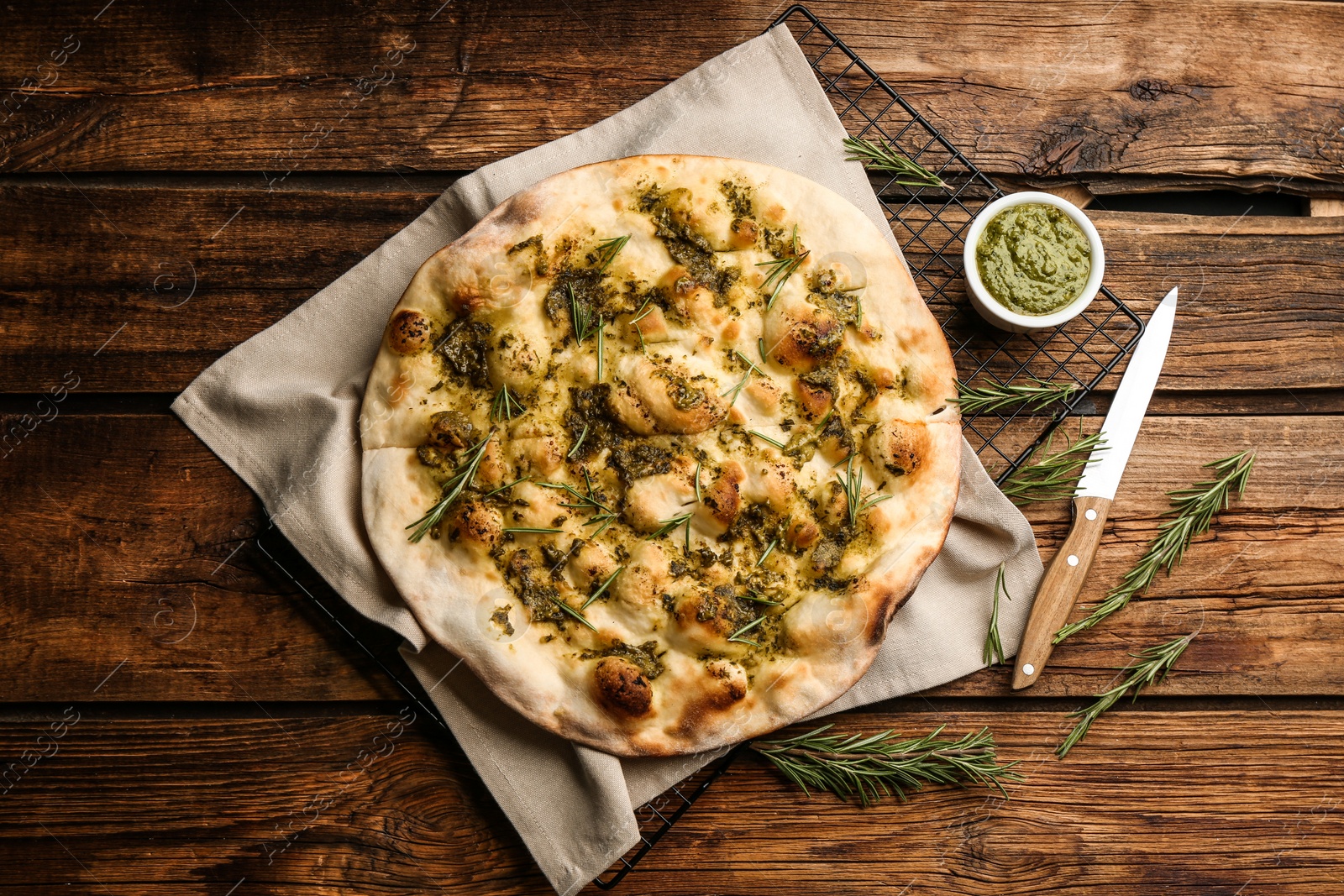 Photo of Flat lay composition with focaccia bread on wooden table