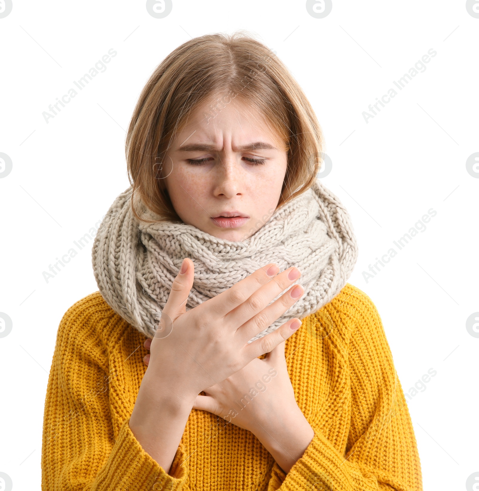 Photo of Teenage girl suffering from cough isolated on white