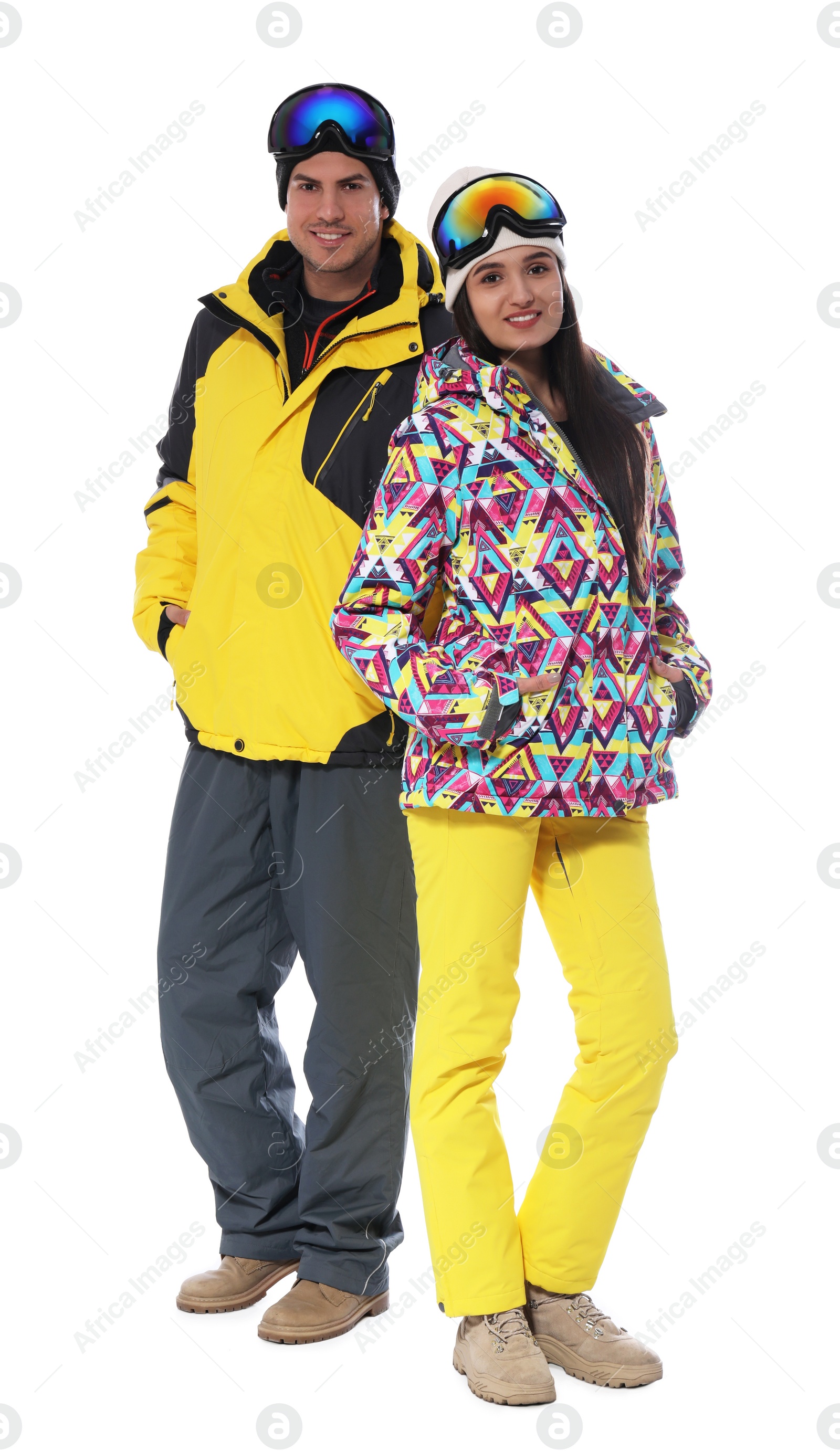 Photo of Couple wearing stylish winter sport clothes on white background