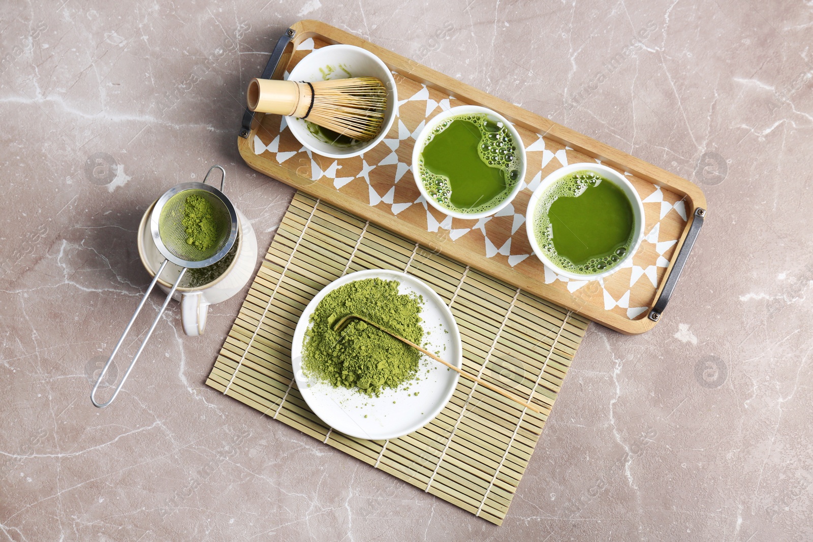 Photo of Flat lay composition with matcha tea on table