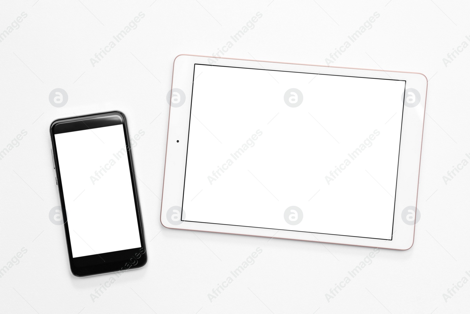 Photo of Modern tablet and smartphone on white background, flat lay. Space for text