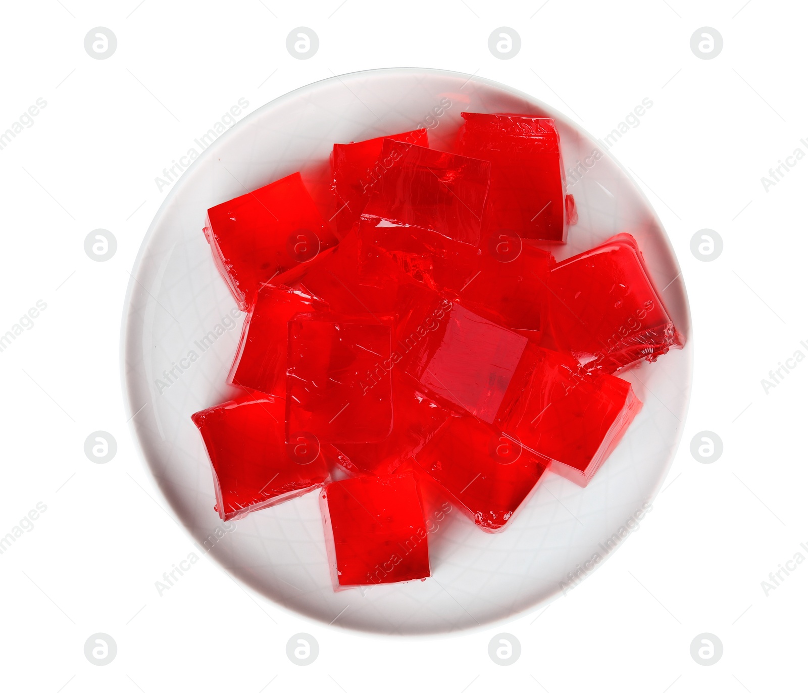 Photo of Plate with red jelly cubes on white background, top view