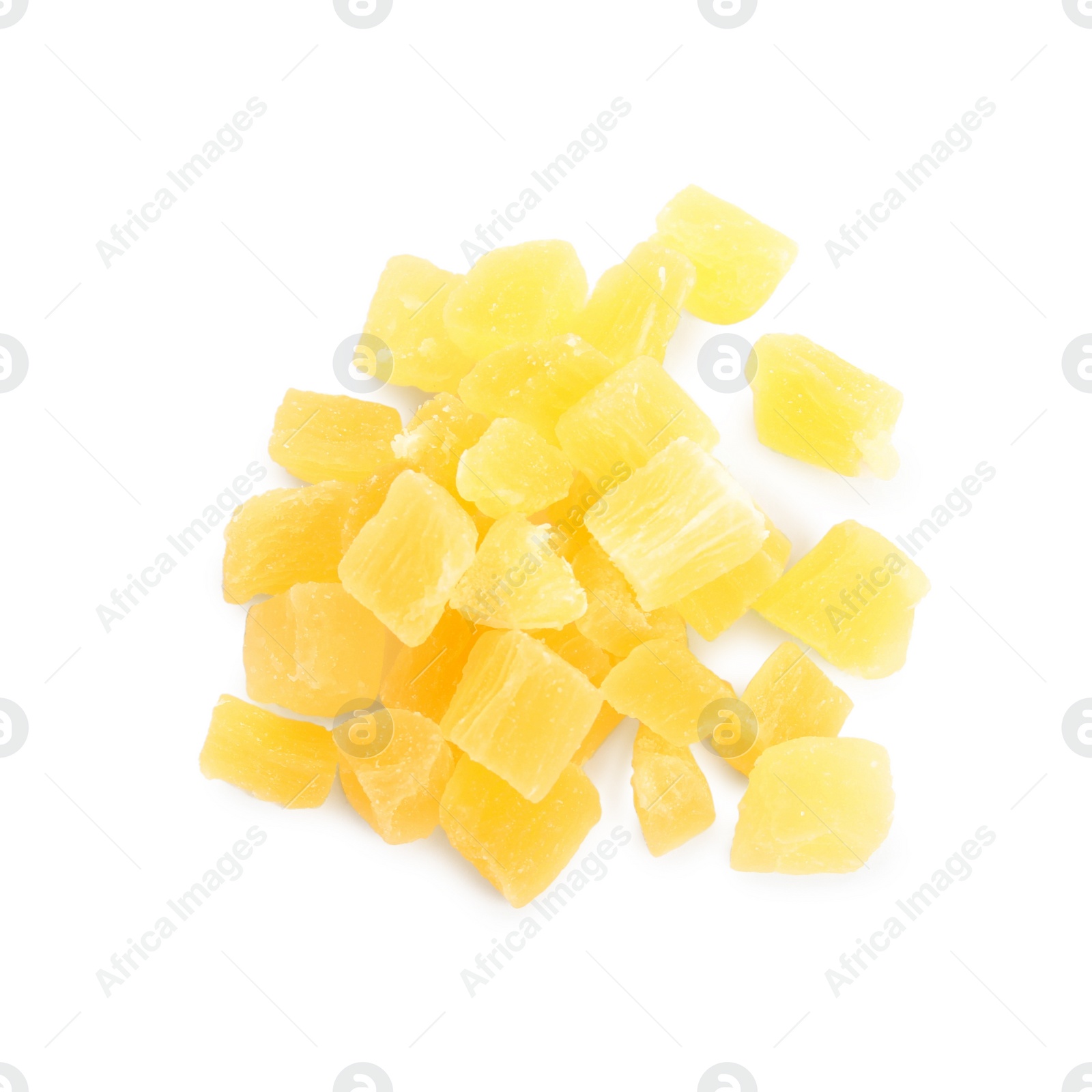 Photo of Delicious yellow candied fruit pieces on white background, top view