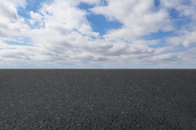 Image of View of empty asphalt road on sunny day