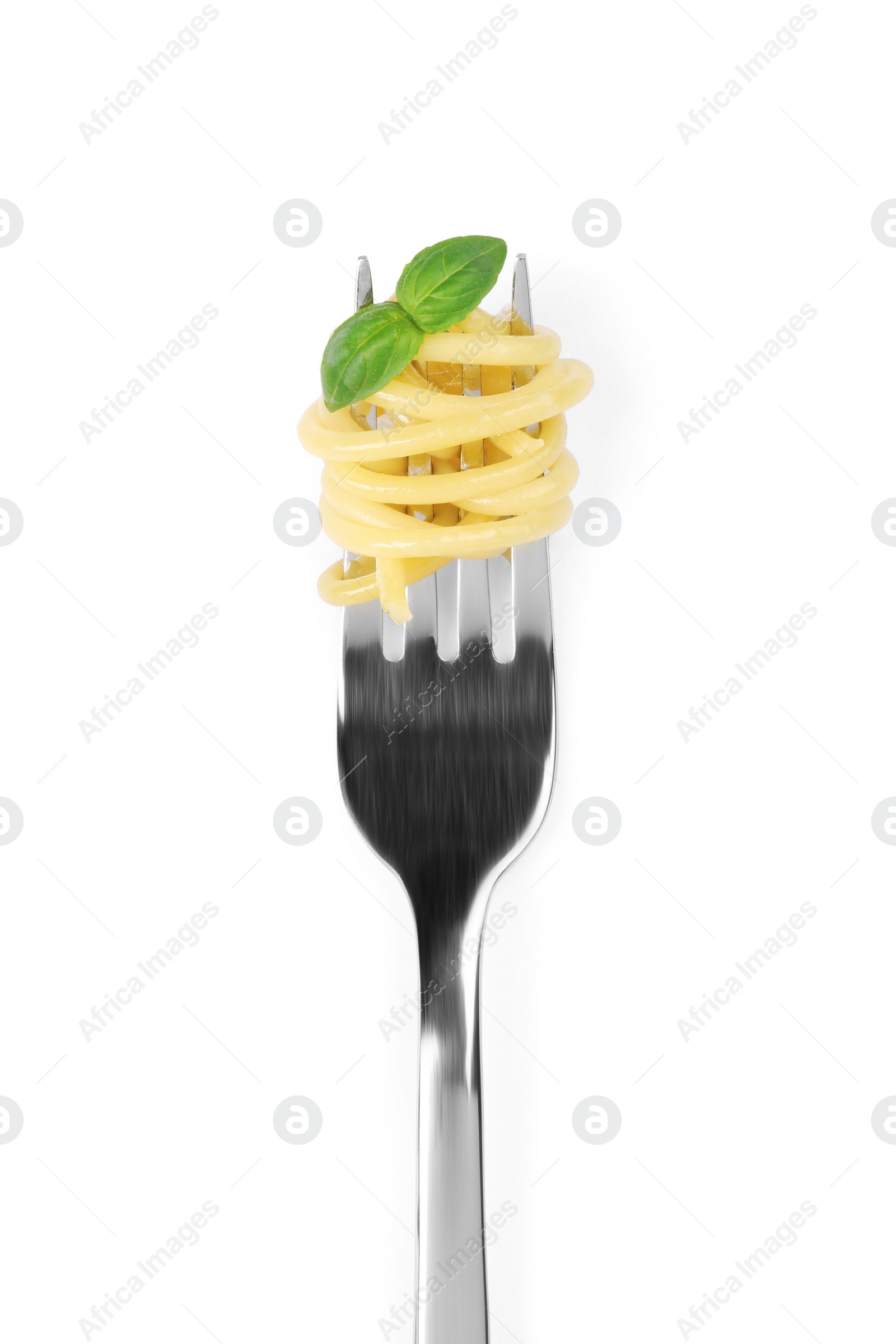 Photo of Fork with tasty pasta and basil isolated on white, top view