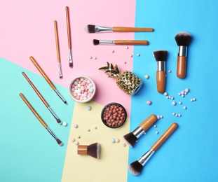 Photo of Decorative makeup products on color background