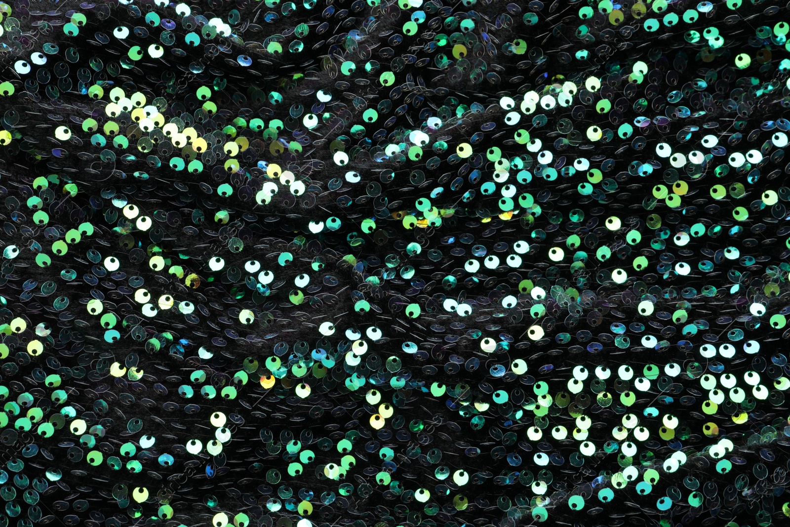 Photo of Beautiful dark sequin fabric as background, closeup