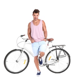 Photo of Handsome young hipster man with bicycle on white background