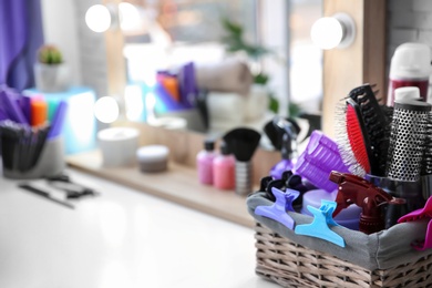 Set of hairdresser tools on table in salon