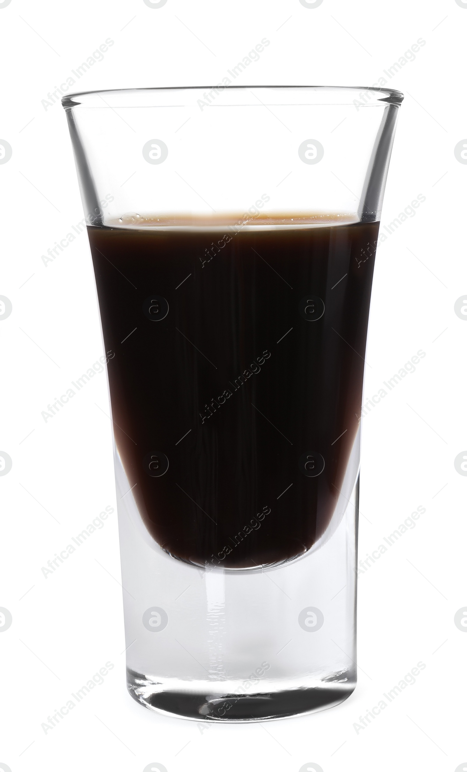 Photo of Shot glass with coffee liqueur isolated on white