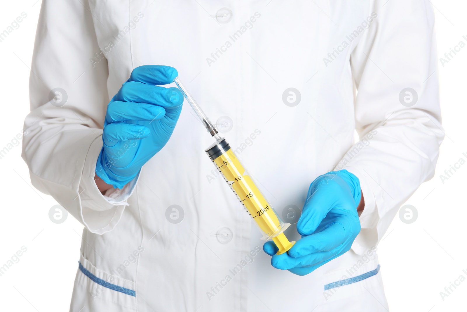 Photo of Doctor in medical gloves holding empty syringe on white background