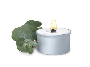 Photo of Aromatic candle with wooden wick and eucalyptus branch on white background