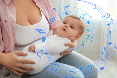 Image of Flying music notes and young woman with her cute baby at home, closeup. Lullaby songs 