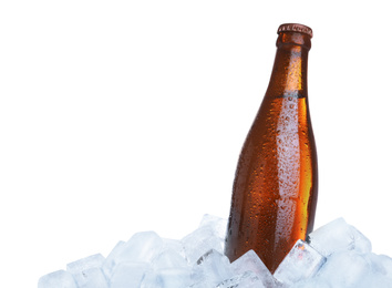 Ice cubes and bottle on white background