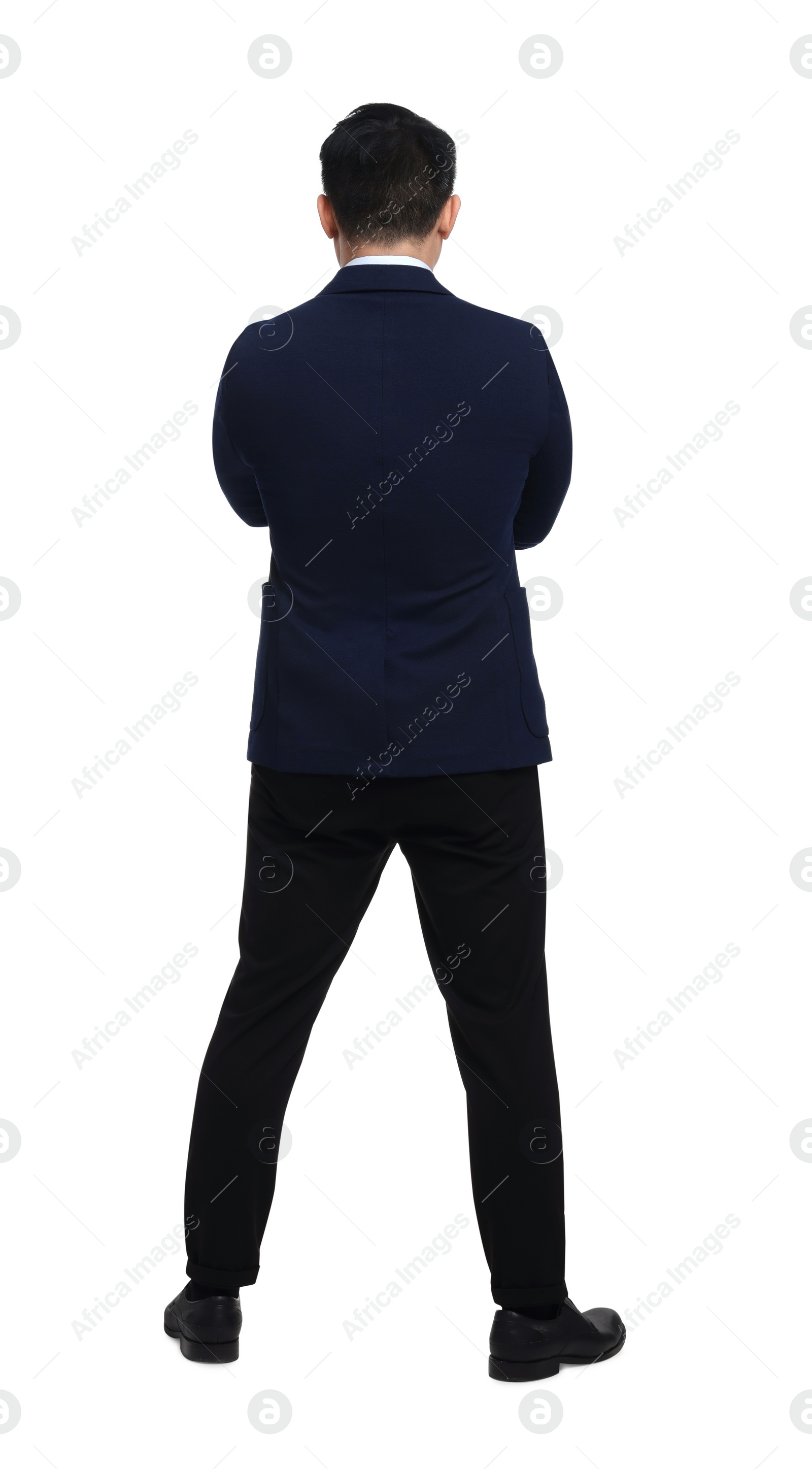 Photo of Businessman in suit posing on white background, back view