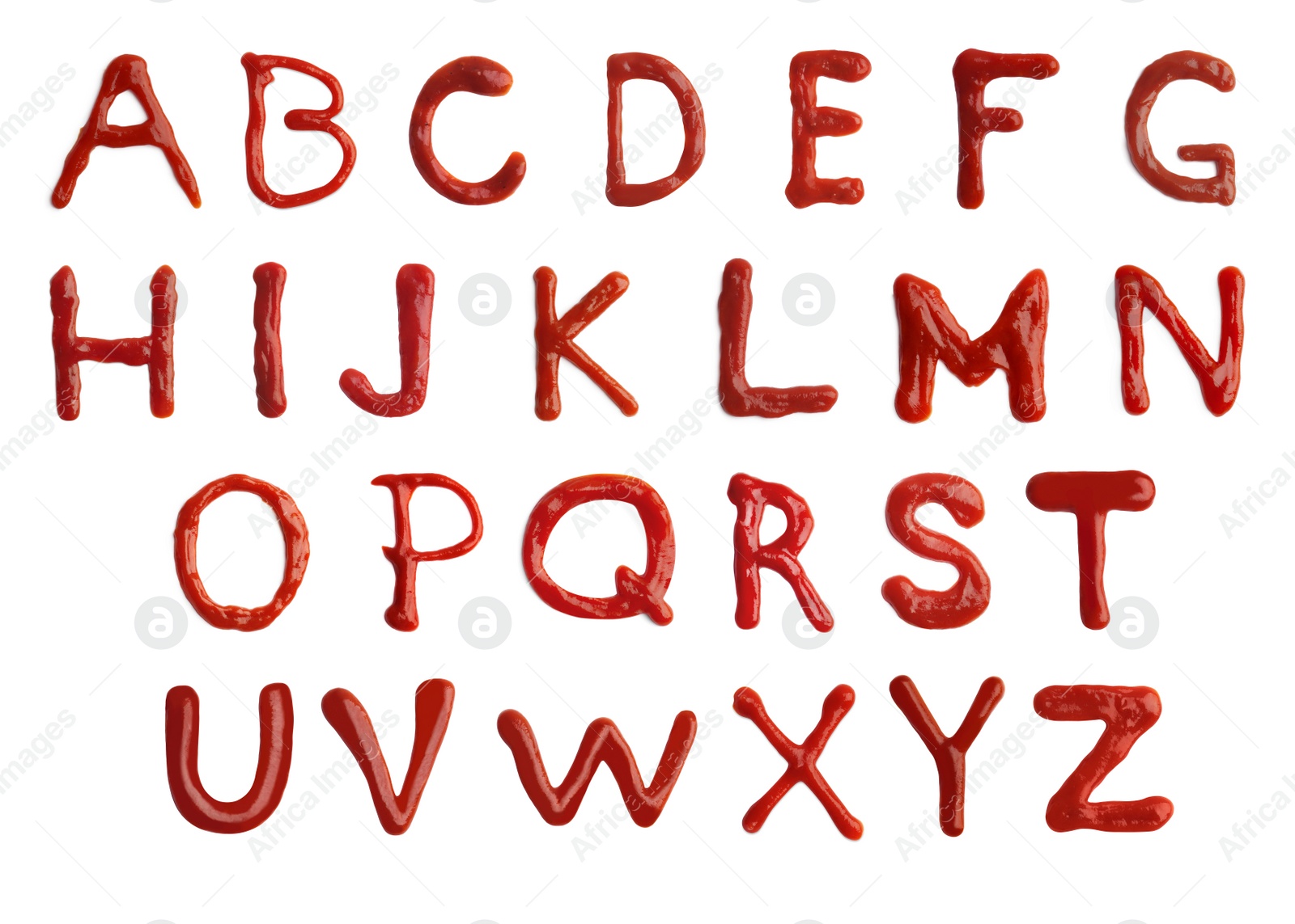 Image of Alphabet made of ketchup on white background