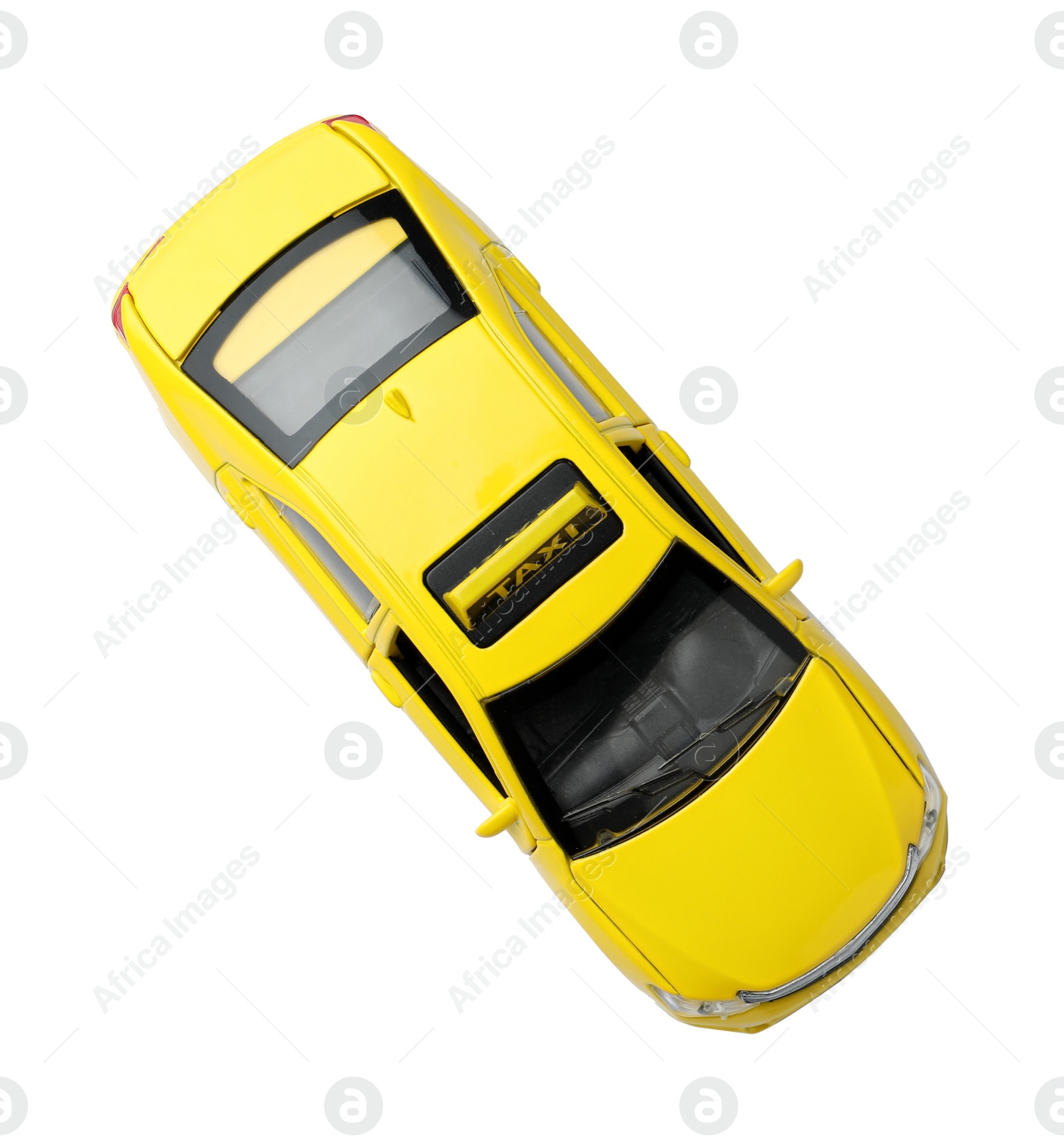 Photo of Yellow taxi car model on white background, top view