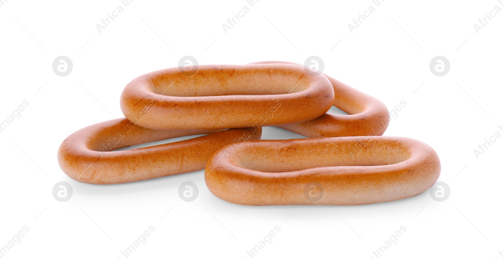 Photo of Tasty dry bagels (sushki) isolated on white