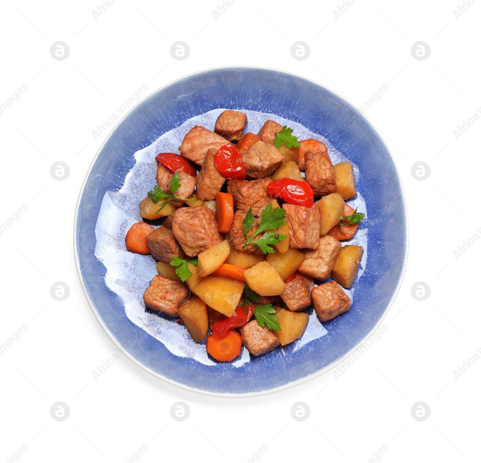 Photo of Plate with delicious goulash isolated on white, top view