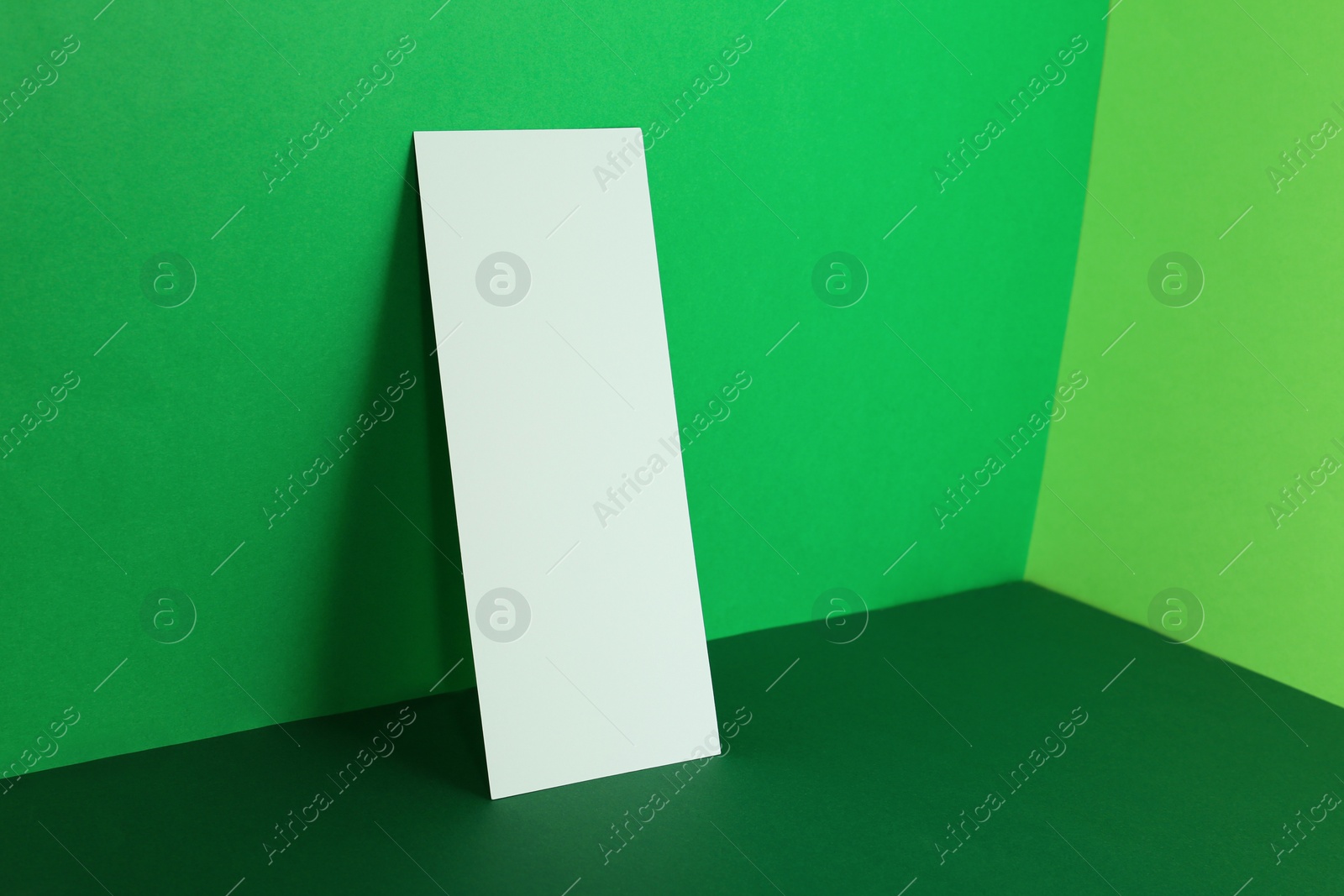 Photo of Empty sheet on color background. Mockup for design