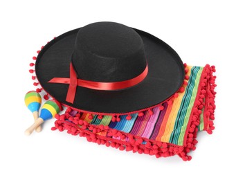 Mexican sombrero hat, maracas and colorful poncho isolated on white