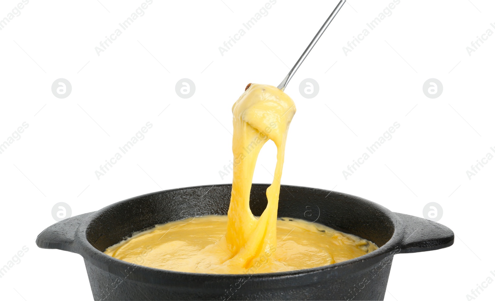 Photo of Dipping piece of bread into fondue pot with tasty melted cheese isolated on white