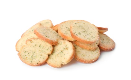 Heap of crispy rusks with seasoning on white background