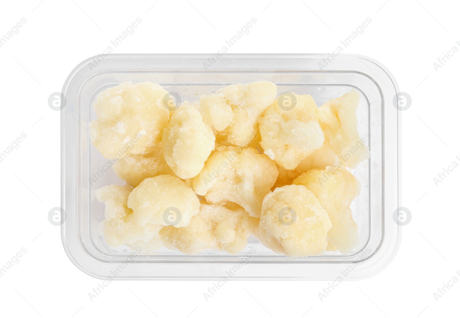 Photo of Frozen cauliflower florets in plastic container isolated on white, top view. Vegetable preservation