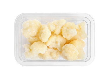 Photo of Frozen cauliflower florets in plastic container isolated on white, top view. Vegetable preservation