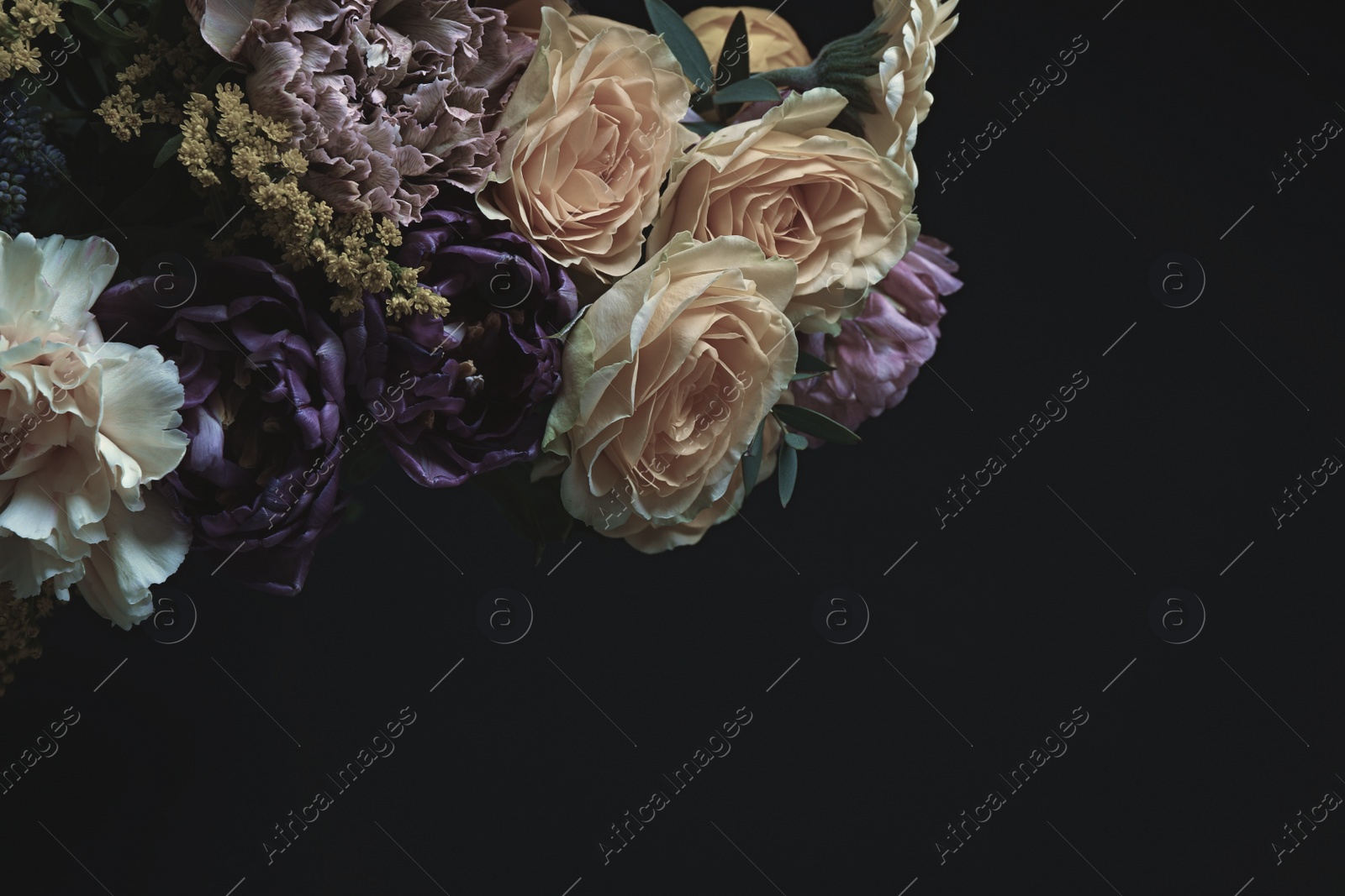 Photo of Beautiful bouquet of different flowers on black background, space for text. Floral card design with dark vintage effect