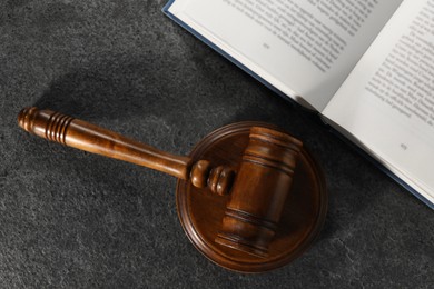 Photo of Law concept. Gavel and book on grey textured table, top view