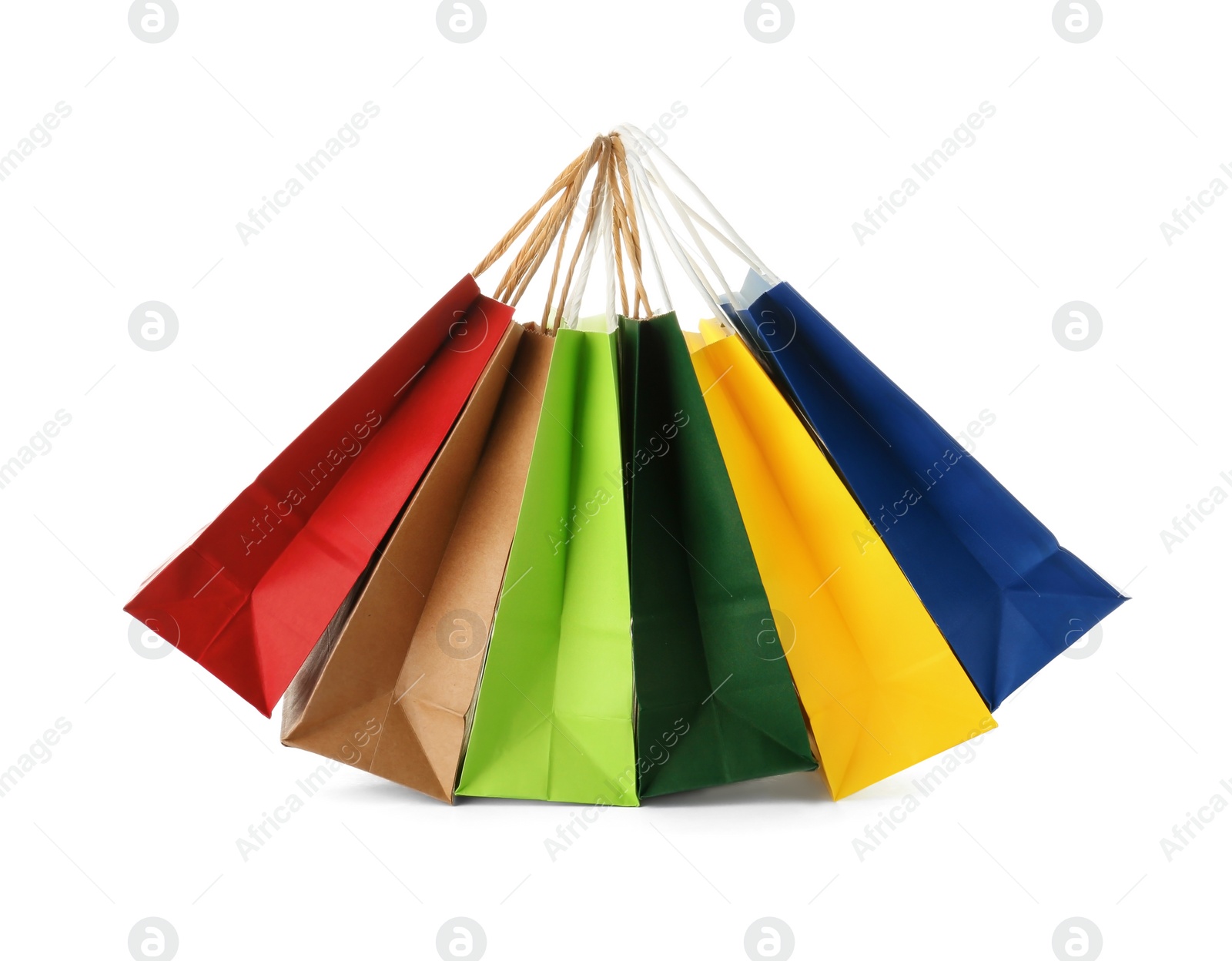 Photo of Empty paper shopping bags on white background