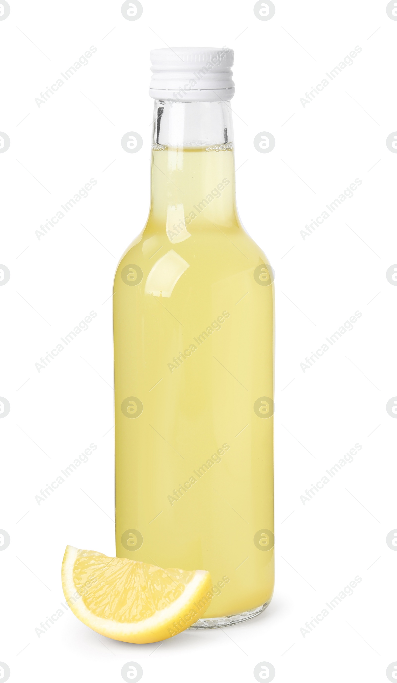 Photo of Delicious kombucha in glass bottle and lemon isolated on white