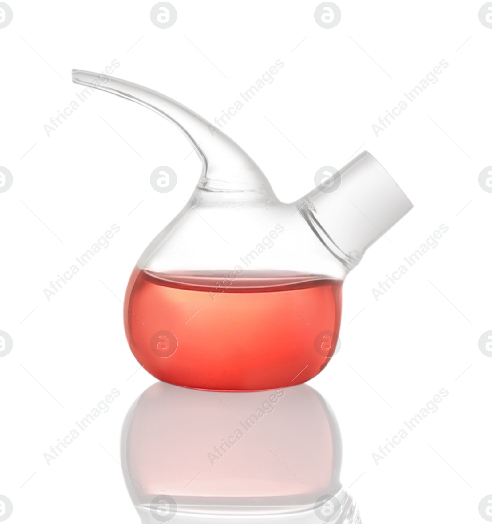 Photo of Retort flask with red liquid isolated on white