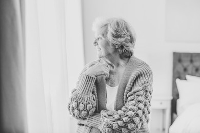 Image of Portrait of beautiful senior woman at home. Black and white photography