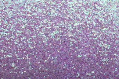 Photo of Beautiful shiny lilac glitter as background, closeup