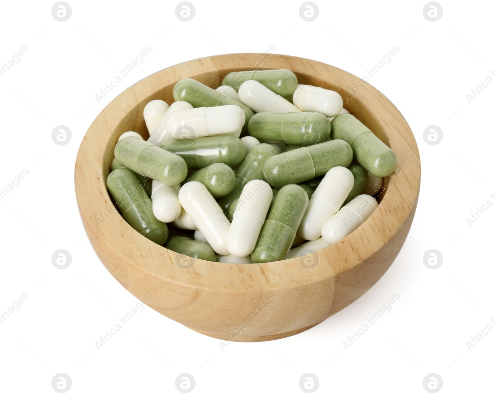 Photo of Vitamin capsules in bowl isolated on white. Health supplement