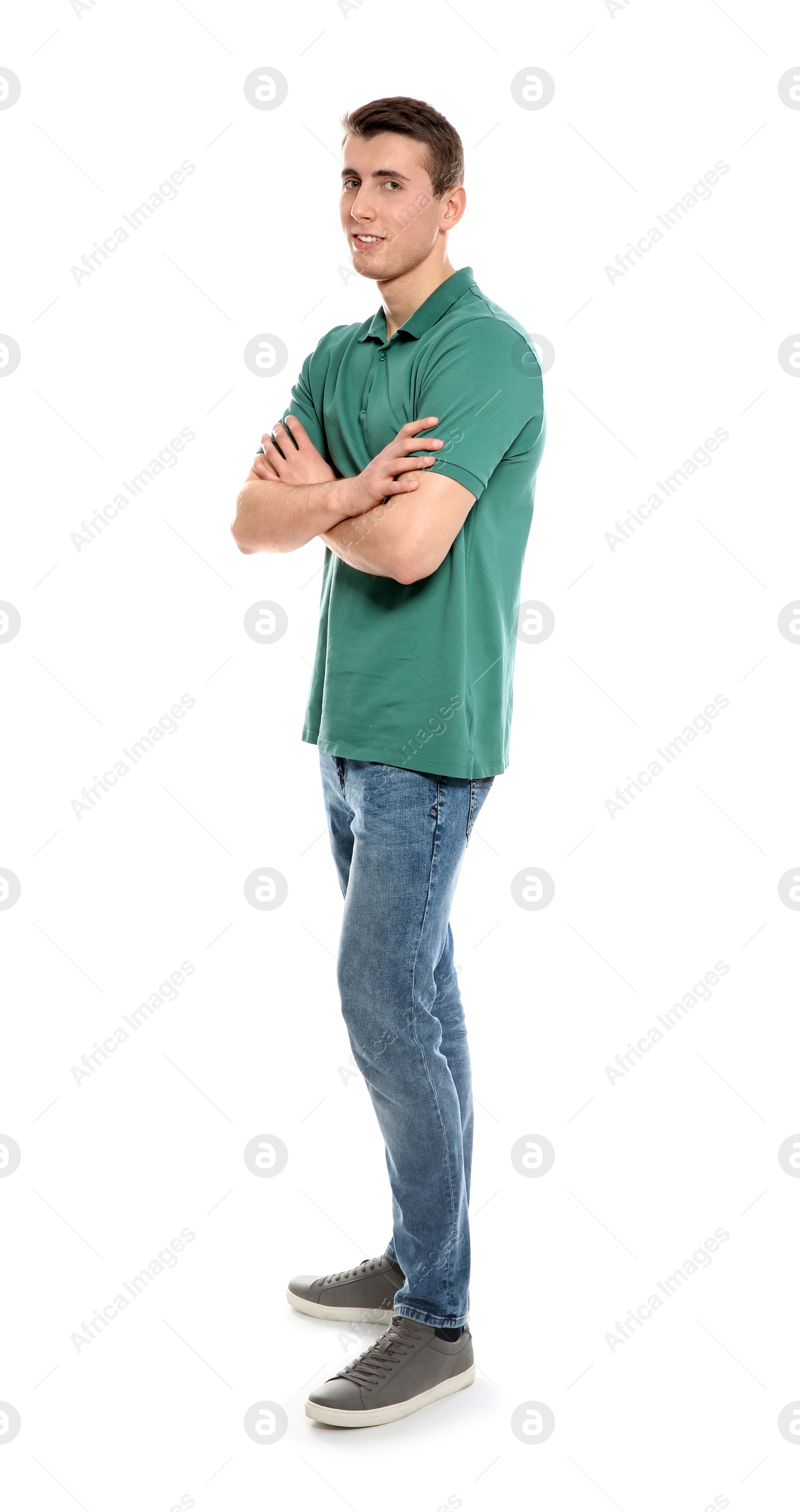 Photo of Full length portrait of young man in stylish clothes on white background