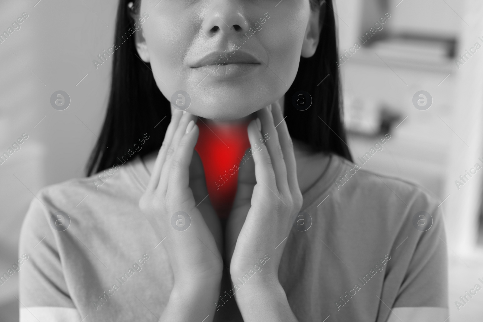 Image of Endocrine system. Woman doing thyroid self examination, closeup. Color accent effect