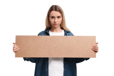 Upset woman holding blank cardboard banner on white background, space for text