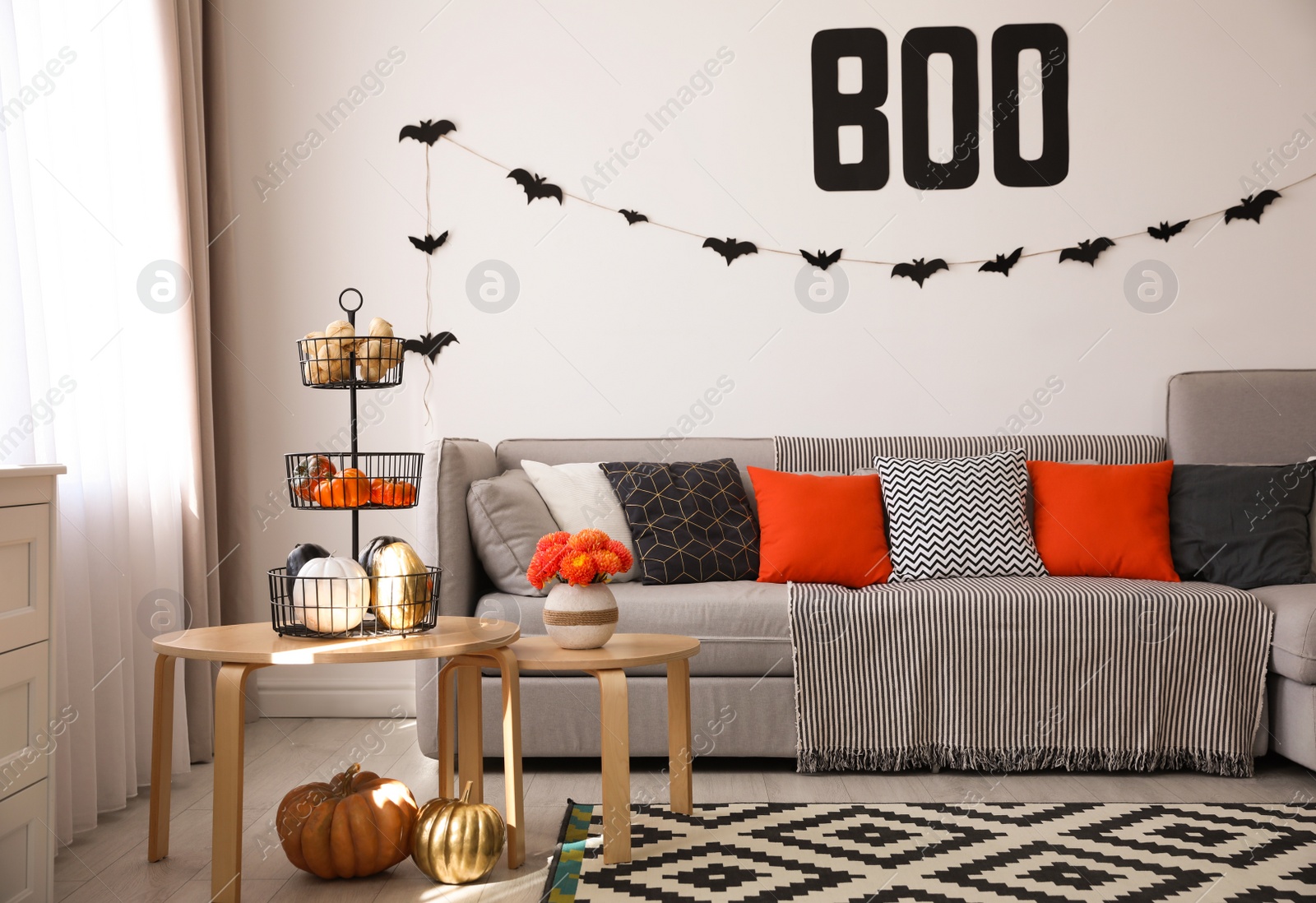 Photo of Modern room decorated for Halloween. Festive interior