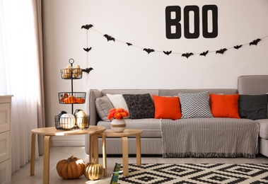 Modern room decorated for Halloween. Festive interior