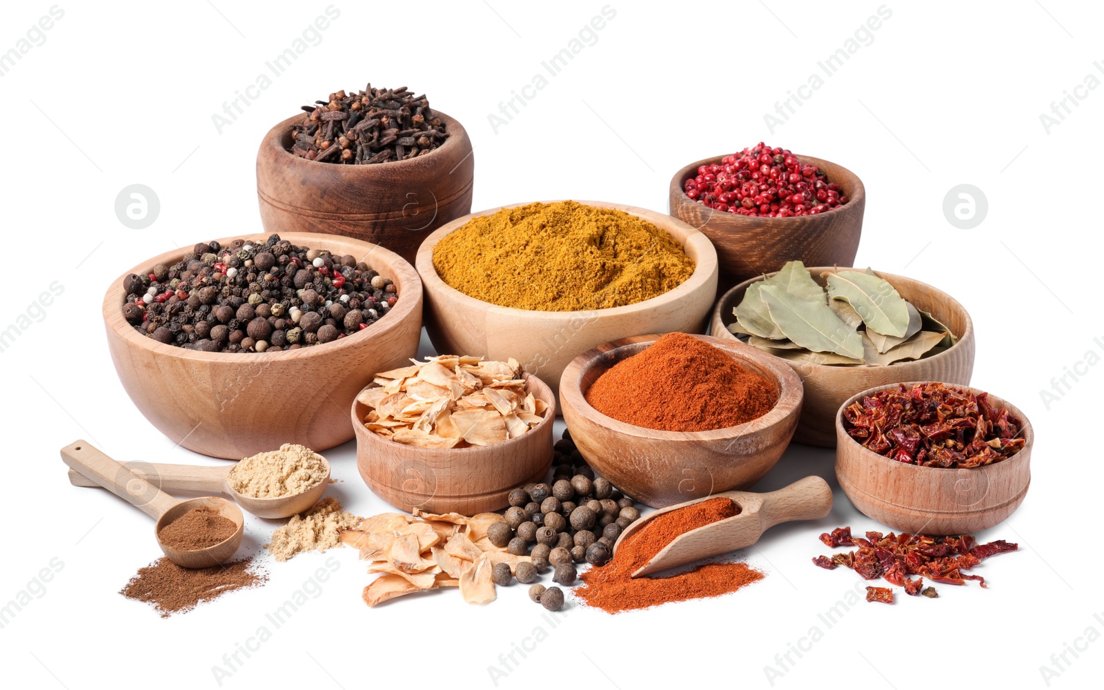 Photo of Bowls with different spices on white background