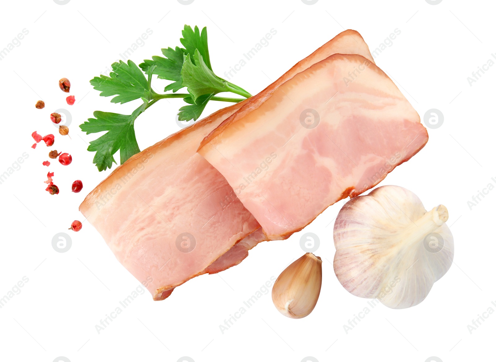 Photo of Slices of delicious smoked bacon with parsley, peppercorns and garlic on white background, top view