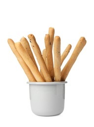 Delicious grissini sticks in cup on white background