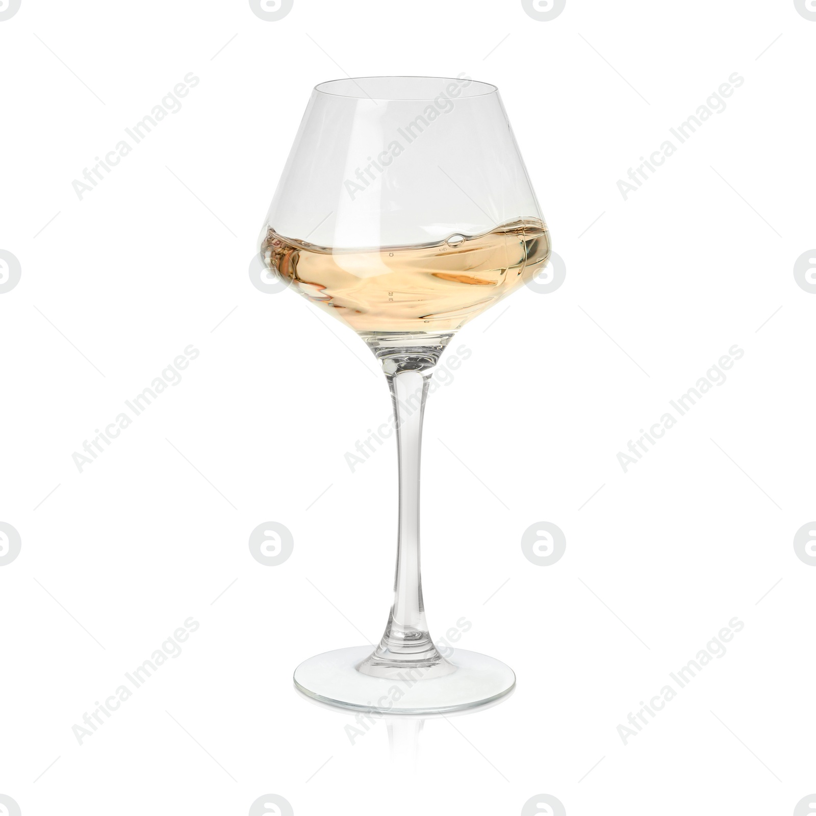 Image of White wine splashing in glass on white background